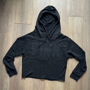 PINK cropped sweatshirt with open back.